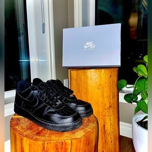 Black Air Force 1. Matte black original laces and tag. Size 9.5. Original box.